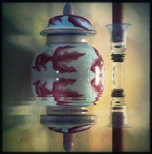 Submergedvaseandcandleblueskybokeh2_3